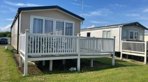Caravan With Large Decking At Coopers Beach Holiday Park Ref 49012Sv